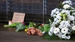 Flowers brought to the site of the shooting to pay tribute to the victims