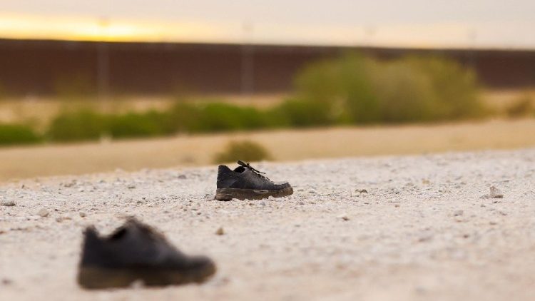 A pair of shoes on the banks of the Rio Bravo river near the Mexican border with the US