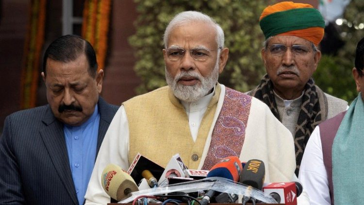 FILE PHOTO: India's Prime Minister Modi speaks with the media inside the parliament premises in New Delhi
