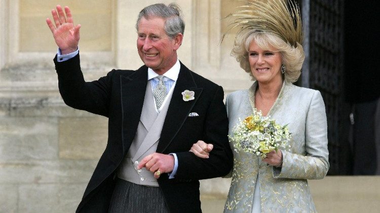 FILE PHOTO: Britain's Prince Charles and the Duchess of Cornwall wave at Windsor Castle after marriage blessing.