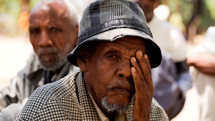 FILE PHOTO: Displaced persons outside their shelter at the Abi Adi camp for the Internally Displaced Persons in Abi Adi town, Tigray Region
