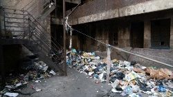 View of litter strewn in the court yard of Vanin Court, a hijacked building in Hillbrow, Johannesburg