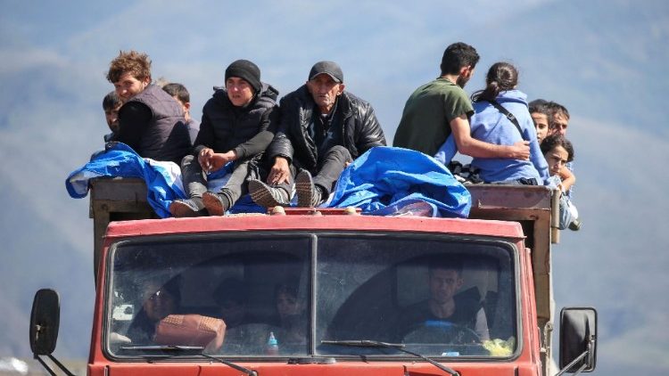 
                    Tens of thousands flee Nagorno-Karabakh
                