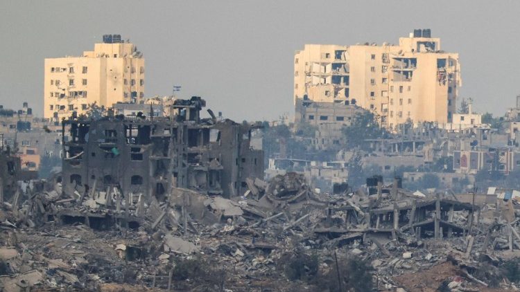 A view of destroyed buildings in northern Gaza, as seen from southern Israel