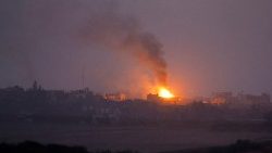 Fire burns after an explosion in north Gaza, as seen from southern Israel