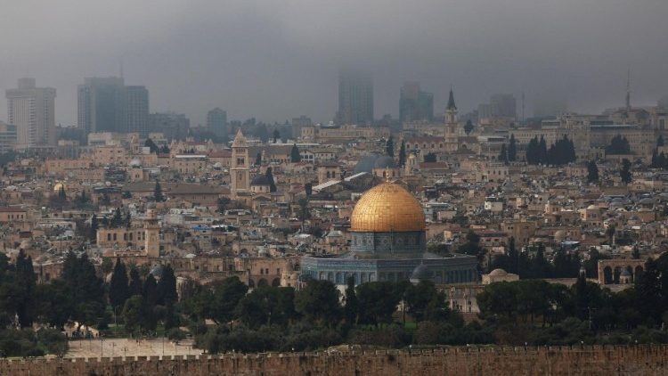 Palestinian Muslims attend Friday prayers in Jerusalem