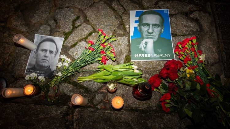 People lay tributes following the death of Russian opposition leader Alexei Navalny, in Wroclaw