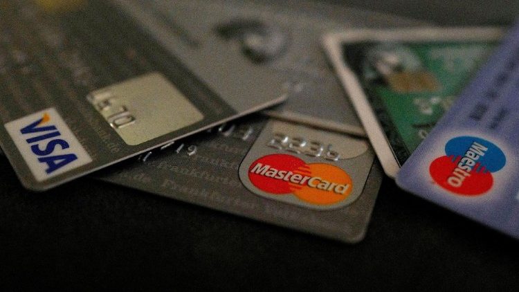 FILE PHOTO: FILE PHOTO: Bank debit and credit cards are photographed in this illustration picture