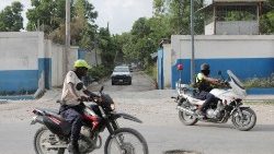 Haitian police patrol the streets