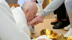 Pope Francis kisses the feet of an inmate of the female section of Rebibbia Prison during a Holy Thursday ritual, in Rome