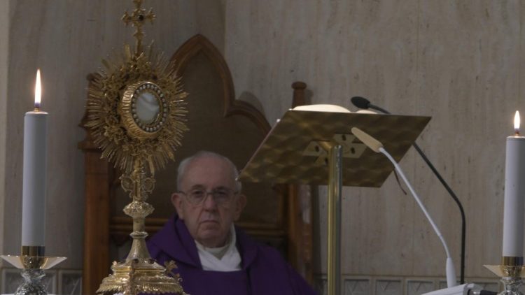 Pope Francis praying before the Blessed Sacrament during Mass at the Casa Santa Marta, 30 March 2020