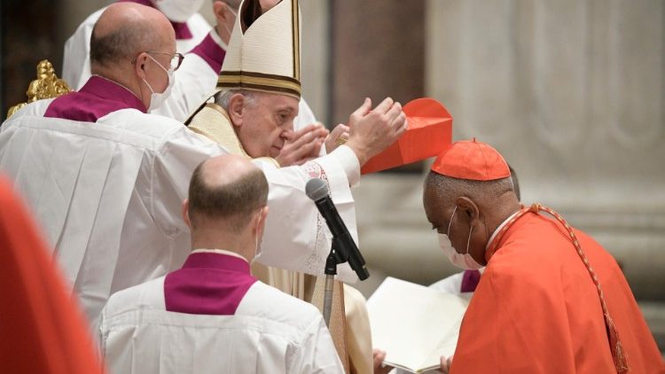 Cardinal Wilton Gregory, Archbishop of Washington DC, receives the red hat from Pope Francis during the Consistory of 28 November 2020