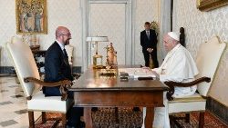 Pope Francis sits with Mr. Charles Michel on Saturday