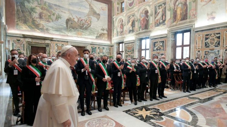 Pope Francis arrives at an audience with Italian mayors