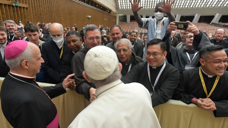 Pope Francis with Archbishop Rino Fisichella greeting Missionaries of Mercy at their final meeting