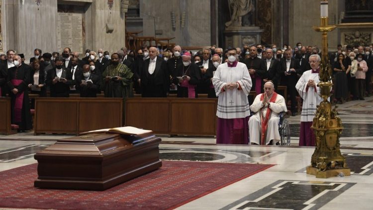 Pope Francis prays at the funeral of Cardinal Angelo Sodano