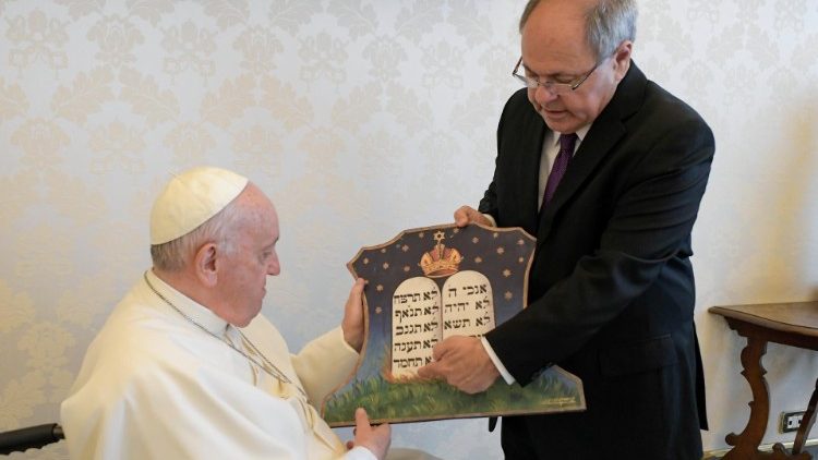 Dani Dayan offers Pope Francis a gift during a private audience in the Vatican