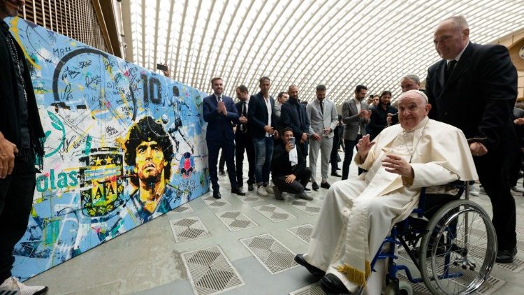 Pope Francis greets football players participating in Match for Peace