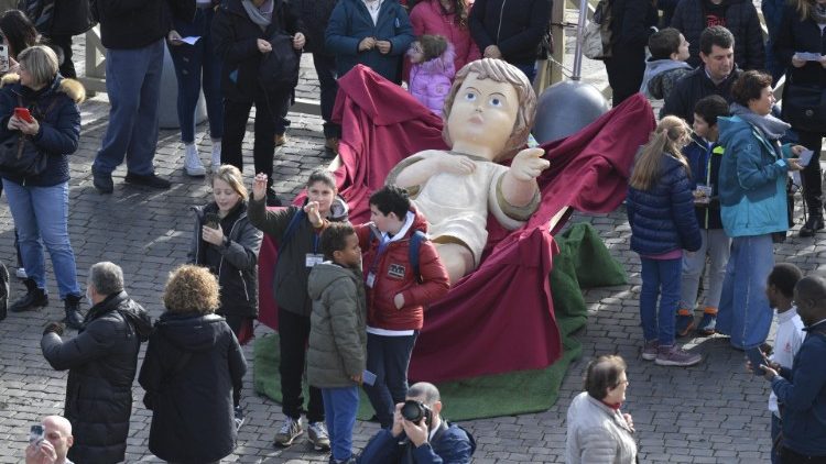 Pope Francis blesses Baby Jesus figurines in St. Peter's Square