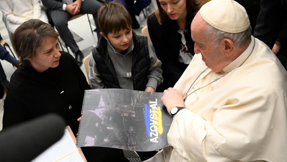 Pope Francis meeting a Ukrainian mother with her son whose husband is a prisoner of war
