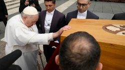 Pope Francis prays over the casket of the late Pope Emeritus Benedict XVI