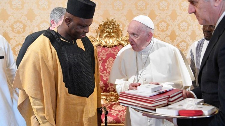 Burkina Faso’s Ambassador to the Holy See, Re'gis Ke'vin Bakyono with Pope Francis.