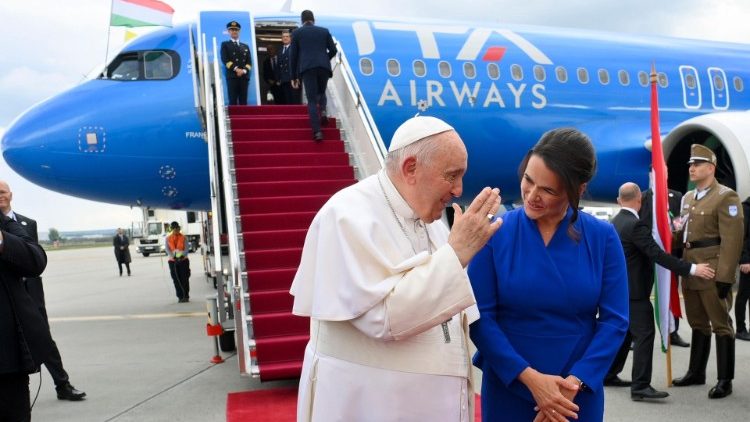 Hungary's President, Katlin Novak, says goodbye to Pope Francis as he prepares to board the papal plane bringing him back to Rome after his apostolic visit