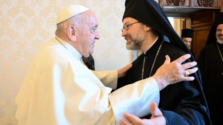 Pope Francis greets Archbishop Job (Getcha) of Pisidia, the head of the Delegation from the Ecumenical Patriarchate