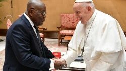 Pope Francis shakes hands with Ghana's President Nana Addo Dankowa Akufo-Addo