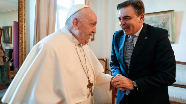 Pope Francis shakes hands with Mr. Margaritis Schinas, Vice-President of the European Commission
