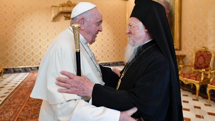 Pope Francis and Ecumenical Patriarch Bartholomew embrace during a meeting in Rome in September