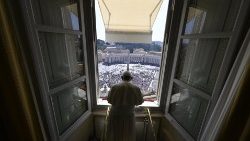 Pope Francis leads the Angelus from his window overlooking St. Peter's Square