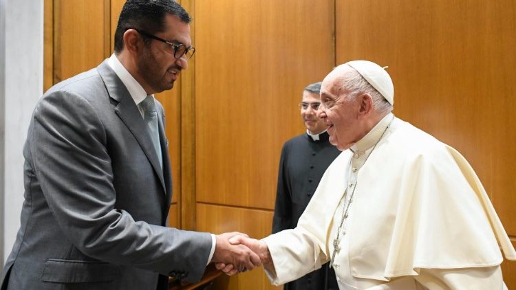 Pope Francis shakes hands with Dr. Sultan Ahmed Al Jaber, President-designate of COP28