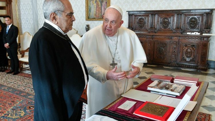 Exchanging gifts with Pope Francis