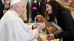 Pope Francis smiles at a member of the Pontifical Academy for Life