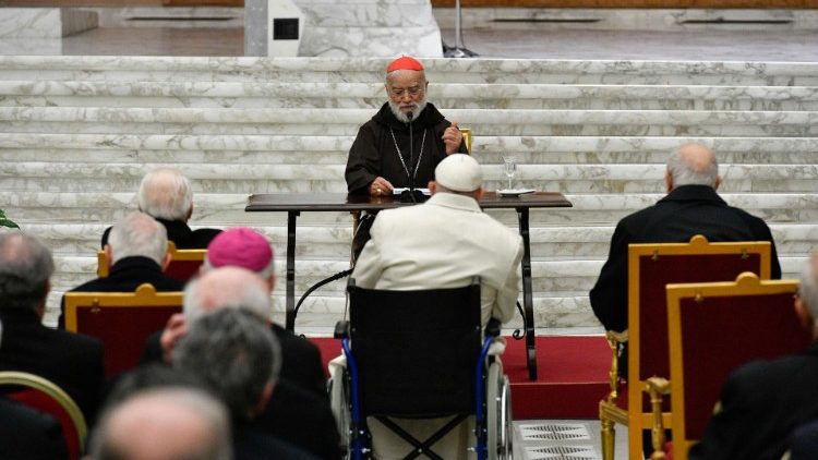 Pope Francis listens to Cardinal Cantalamessa's sermon