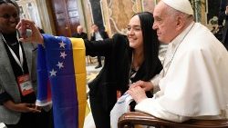 The Pope with a participant in the International Congress on Youth Ministry