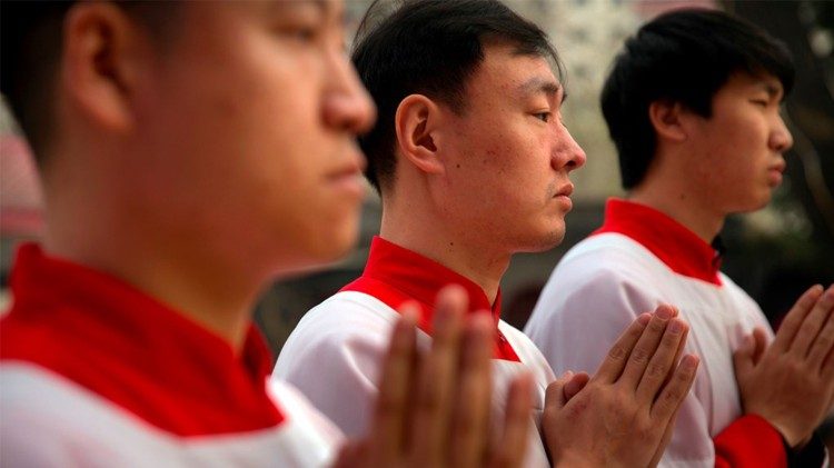 Chinese Christians during Holy Mass