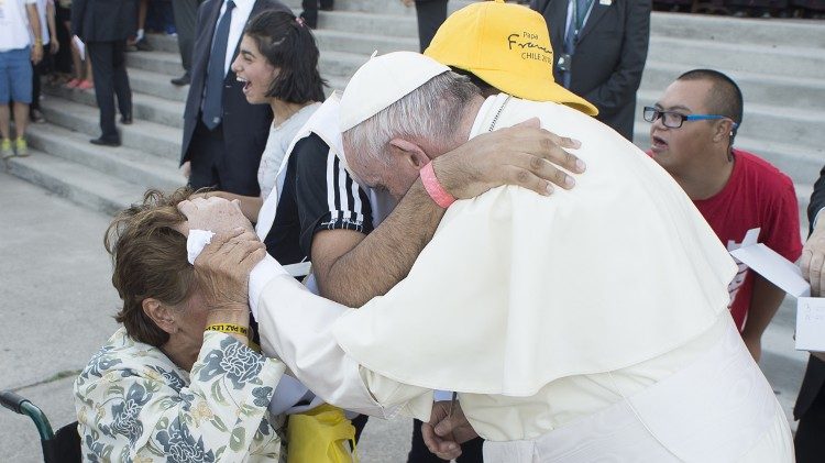 Pope meeting a sick person and her caregiver in Chile in January 2018. 