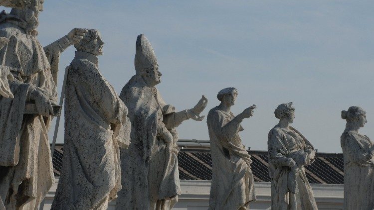 Figures of saints atop the colonnade of St. Peter's Square. 