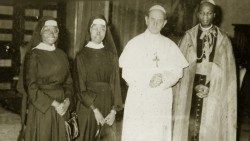 Sisters Petronilla Mukagoa (extreme left) and Laurina Kokutona accompanied by Cardinal Laurean Rugambwa (extreme right)