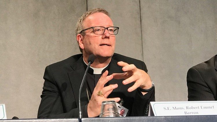 Bishop Robert Barron during a press briefing at the Synod on Young People