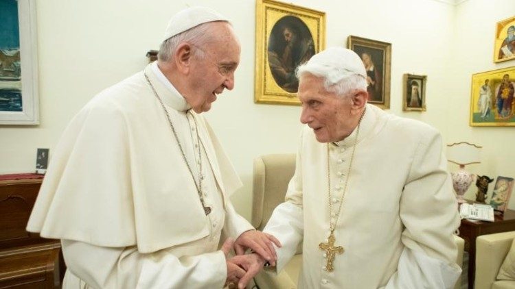 Pope Francis greets Pope emeritus Benedict XVI (file photo)
