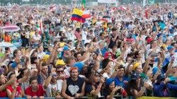 Young Catholics await the arrival of Pope Francis at a World Youth Day event in Cracow in 2016