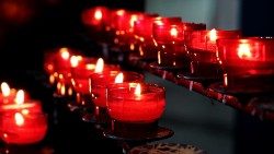 Votive prayer candles.