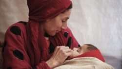 Une femme syrienne et son enfant 