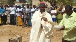 (File photo) A Bishop blesses a church building site in Fada N'Gourma