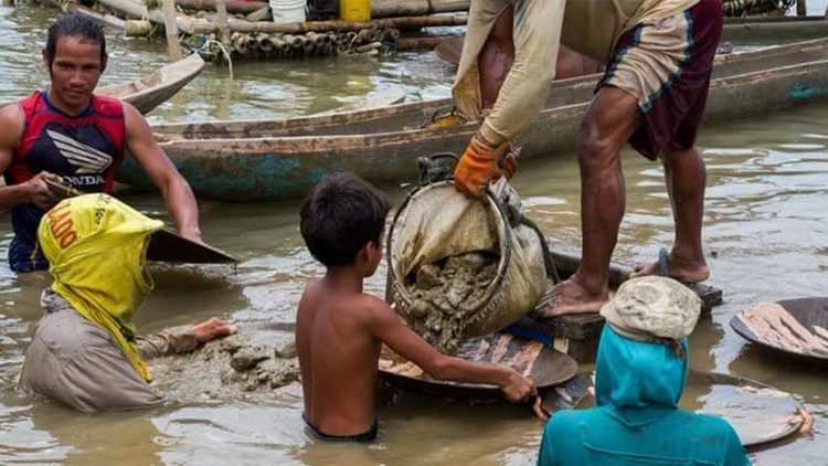 Child labourers engaged in a mine in the Philippines. 