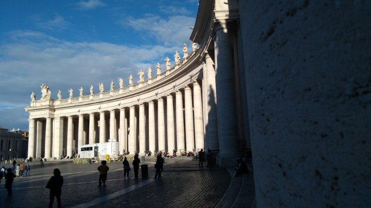 Statues of saints atop the colonnade of St Peter's Square 