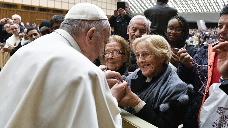 Pope Francis greets women